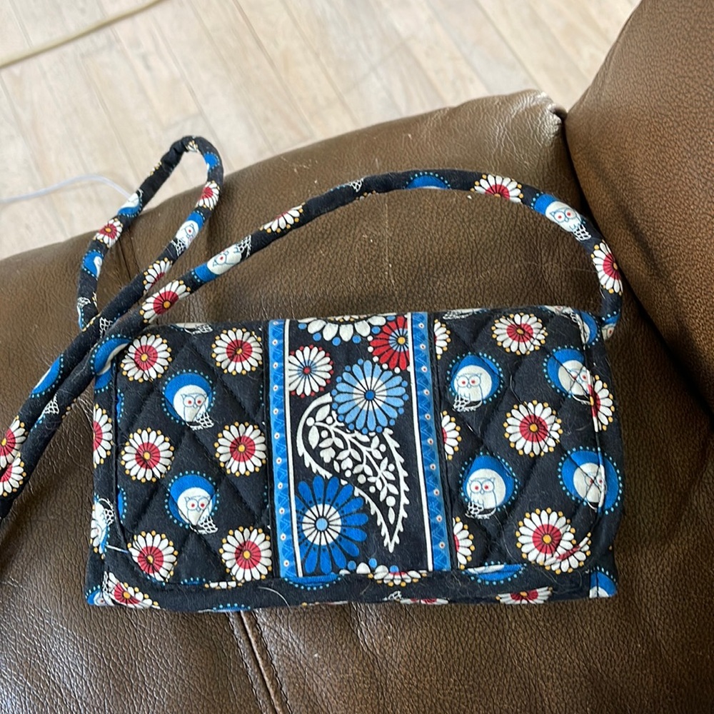 Never used , Vera Bradley, clutch or use strap and crossbody